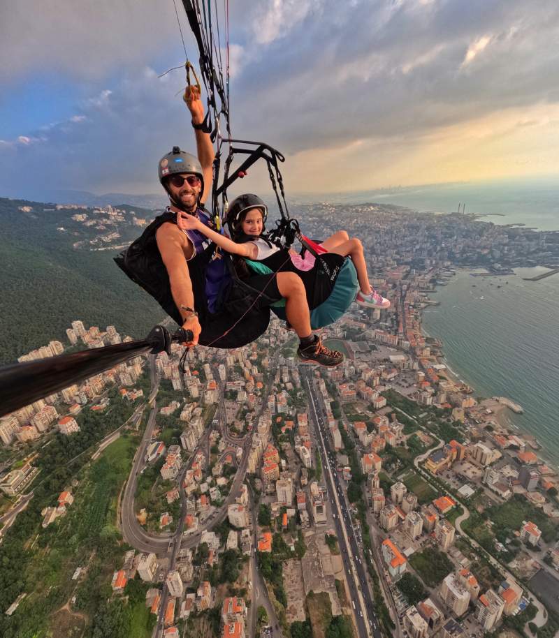 Tandem paragliding flight over Lebanon's coastline